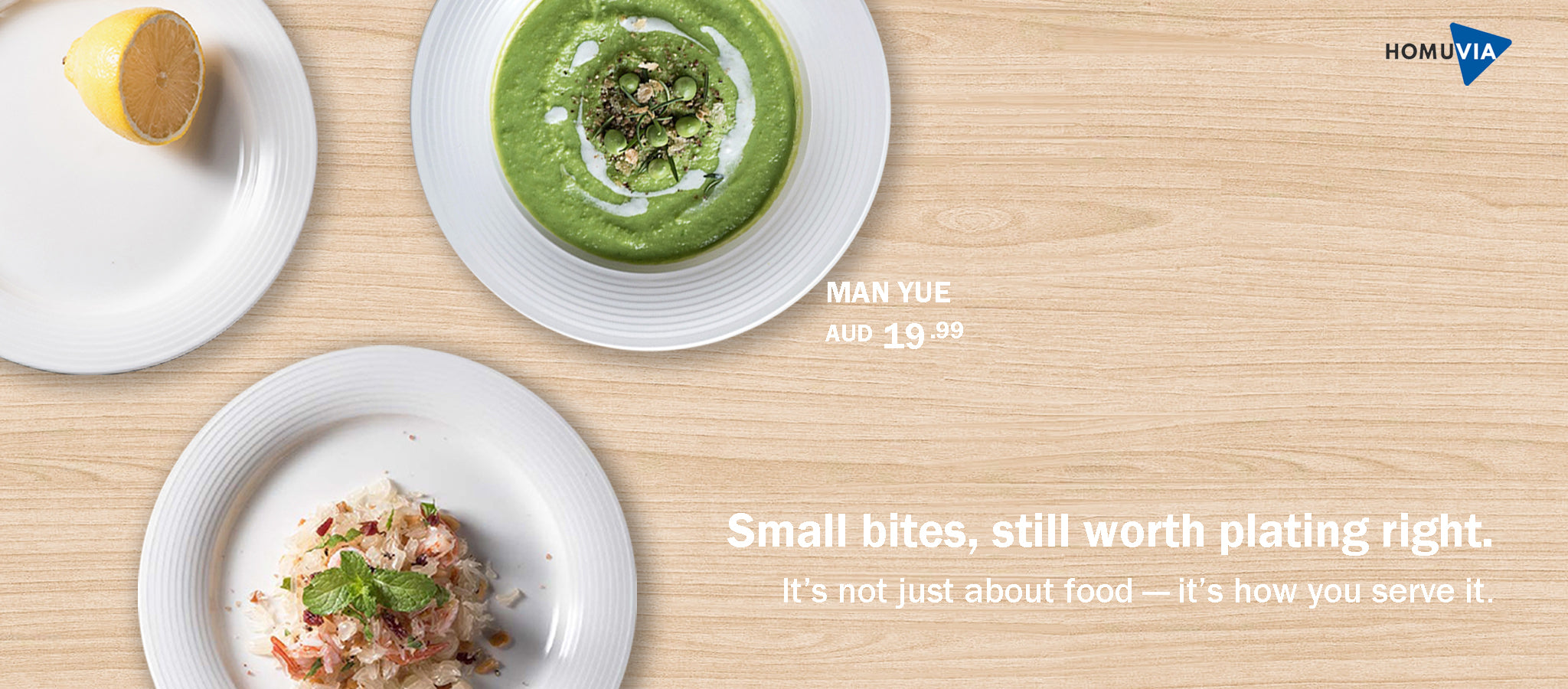Flat lay of white ceramic plates with food on wood surface, product promo for MANYUE plate.