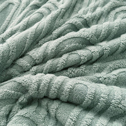 Close-up of dusty sage arch texture on soft fleece blanket