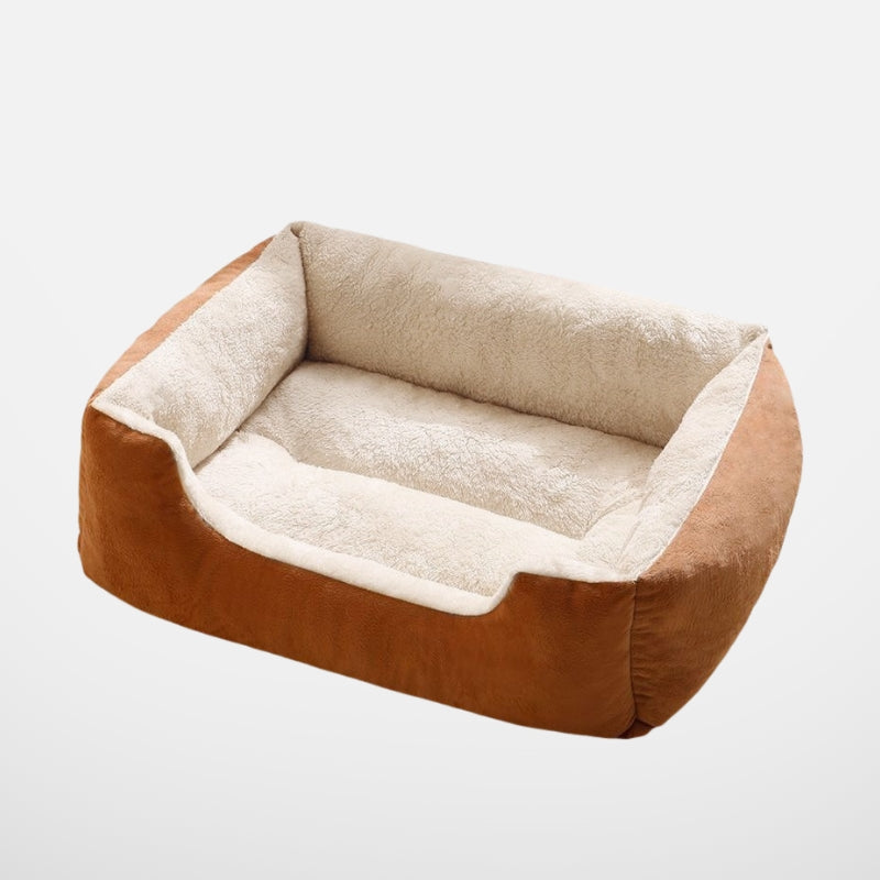 A product shot of a brown rectangular plush pet bed with a soft cream-colored interior, isolated against a neutral background.