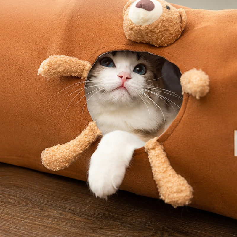 Cat peeking through side hole of brown bear design cat tunnel toy