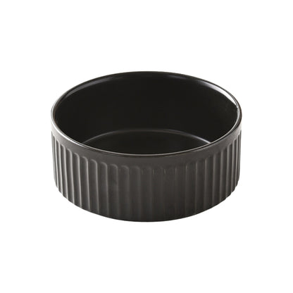 Black ceramic pet bowl with vertical ridges and a sleek, modern design.