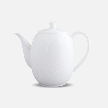 CAI white ceramic teapot with curved handle and lid, studio shot.