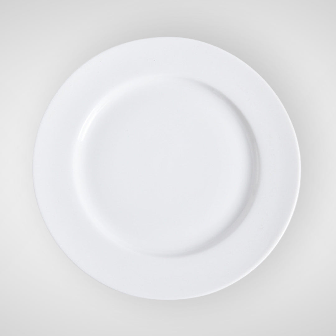 Minimalist white ceramic plate, top view on light background