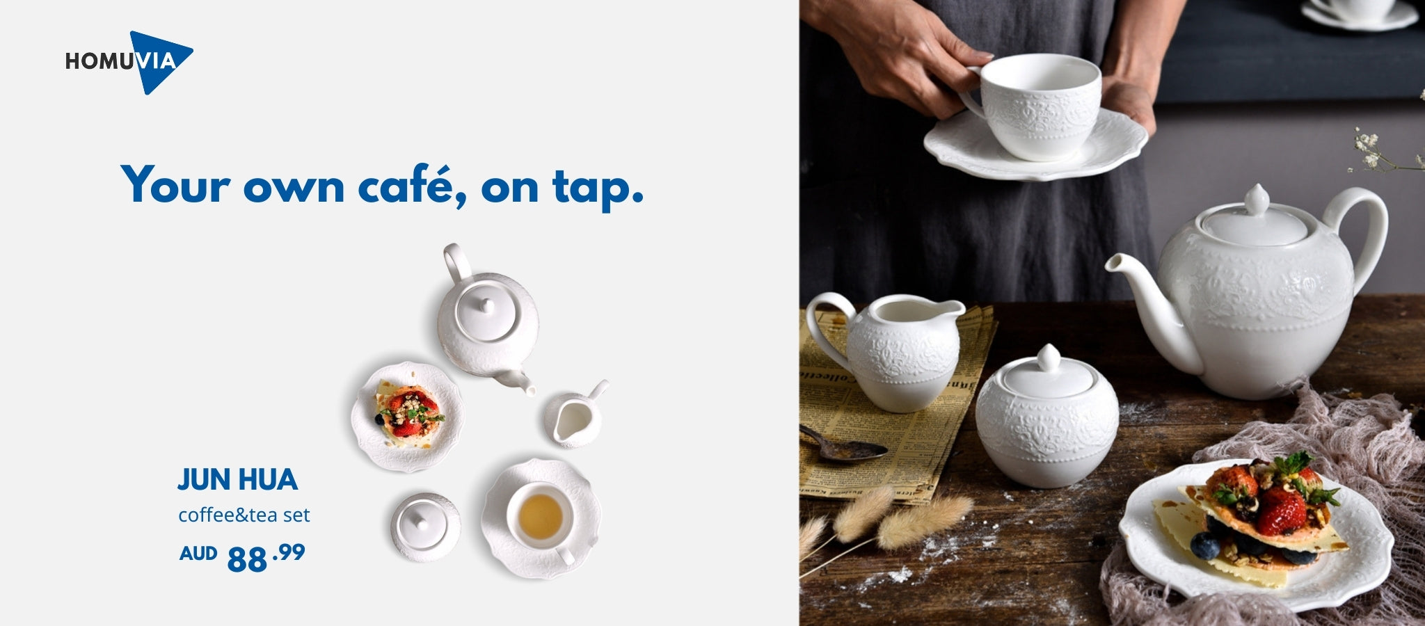 A beautifully embossed white ceramic coffee and tea set is displayed on a rustic wooden table. The set includes a teapot, creamer, sugar bowl, and teacups, all adorned with a detailed relief pattern, creating a classic and charming afternoon tea setting.