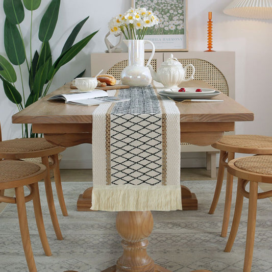 Linen runner featuring black diamond geometric pattern