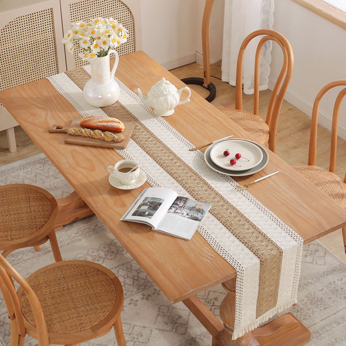 Handwoven beige table runner in boho rustic dining setting