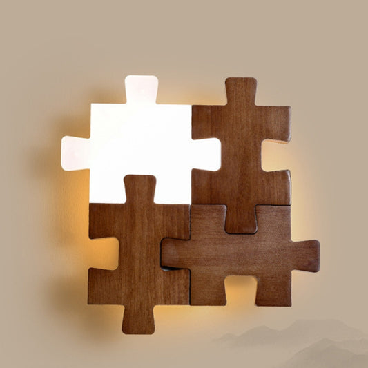 Wooden puzzle piece wall lamp with warm LED light for modern home decor