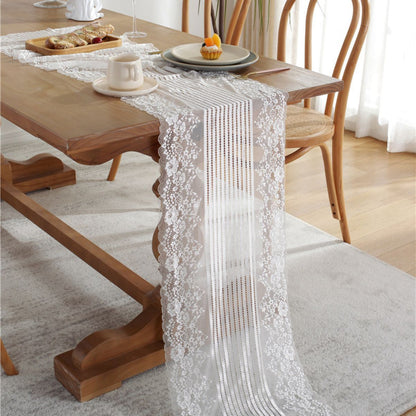 Lace runner draped over table edge