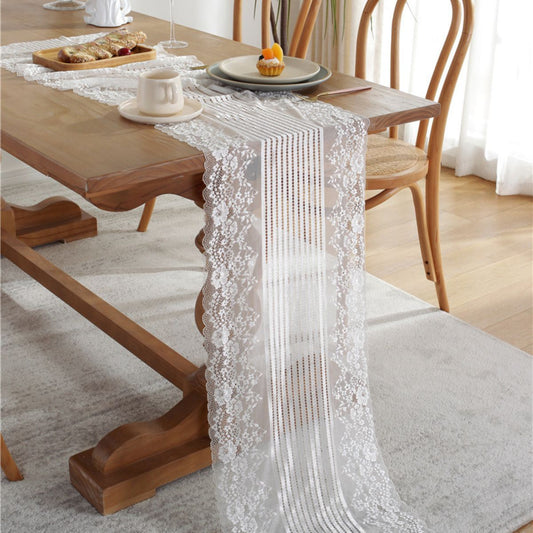 Lace runner draped over table edge