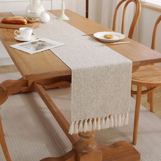 Long woven tassel table runner on dining table