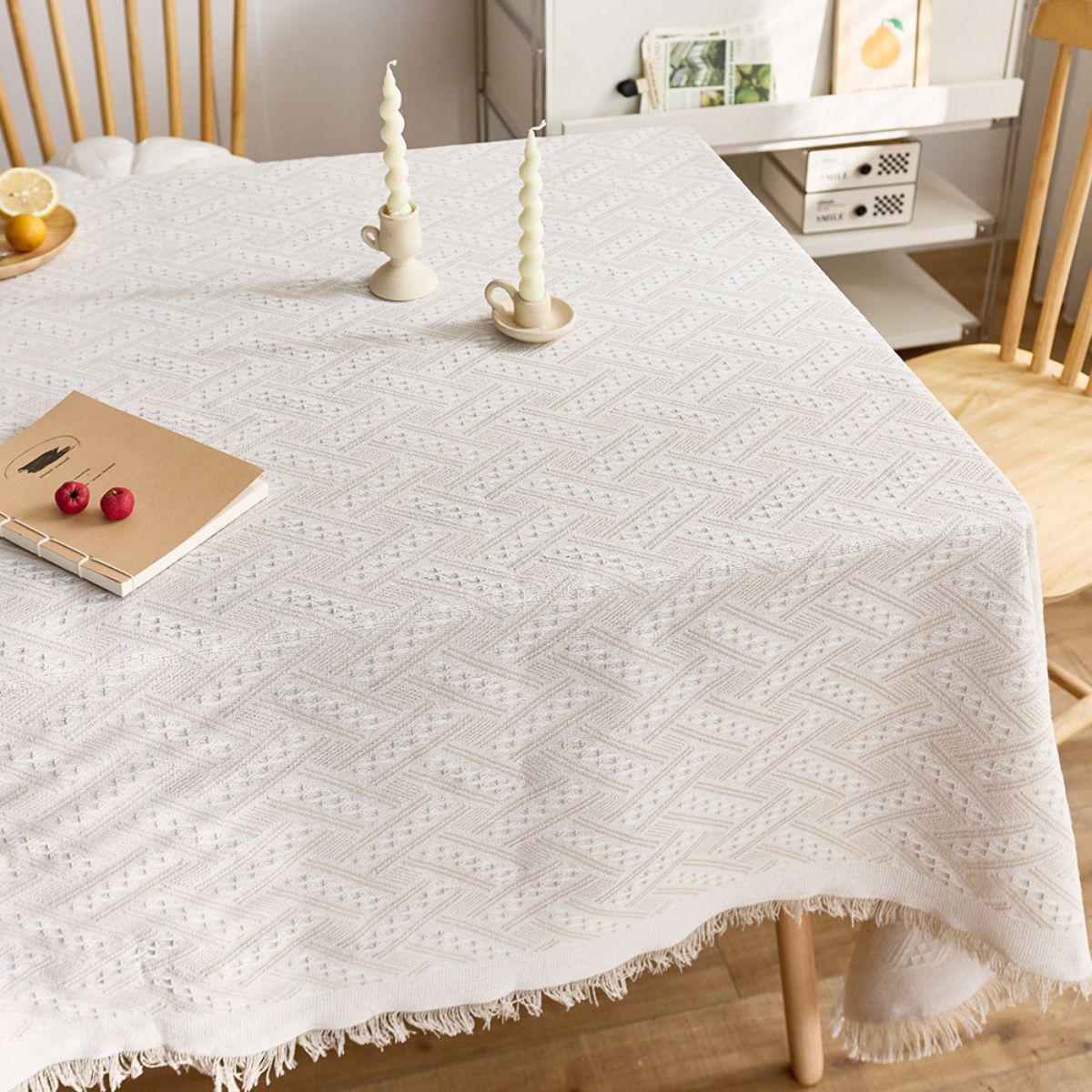 Styled chevron tablecloth with candles and notebook