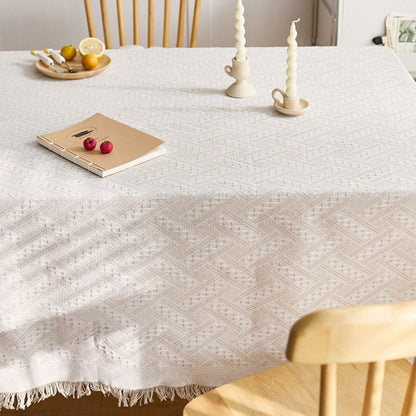 Close view of textured chevron pattern with fringe