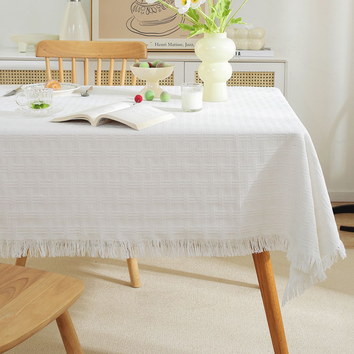 Grid pattern white tablecloth with delicate fringe