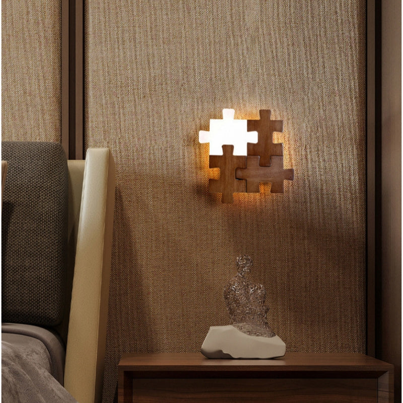 Wooden puzzle wall light creating cozy ambient glow in bedroom