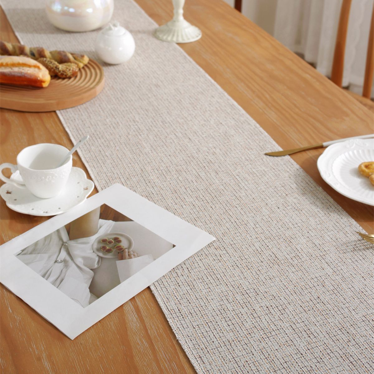 Table styling with woven runner and breakfast setup